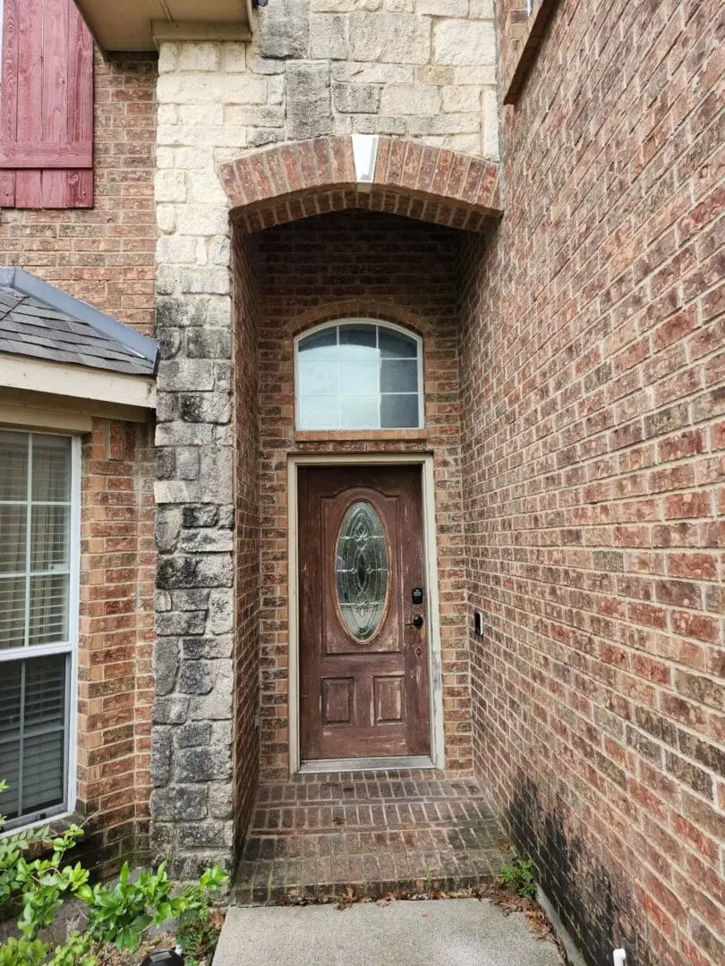 Front Entrance With Mold on the Stone Before ARP Wash