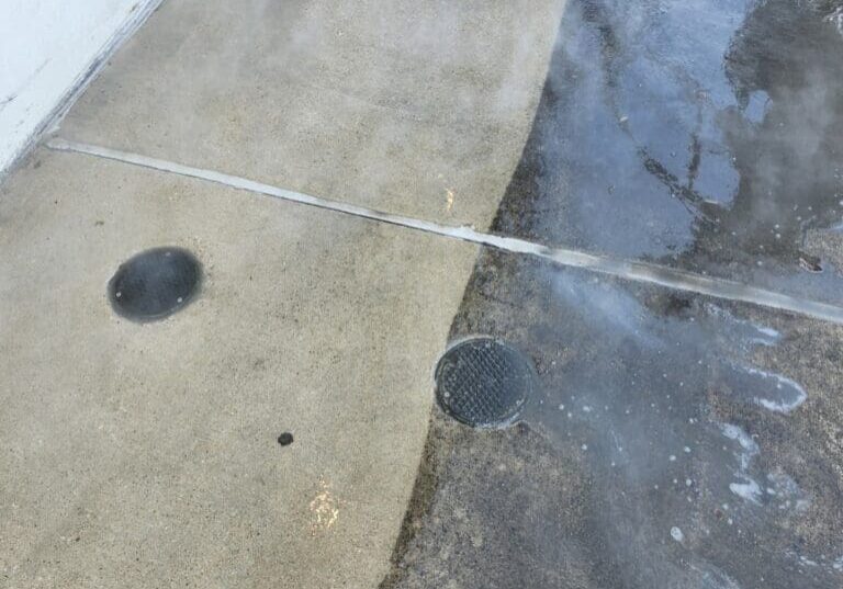 Power Washing Concrete With Surface Cleaner in DFW